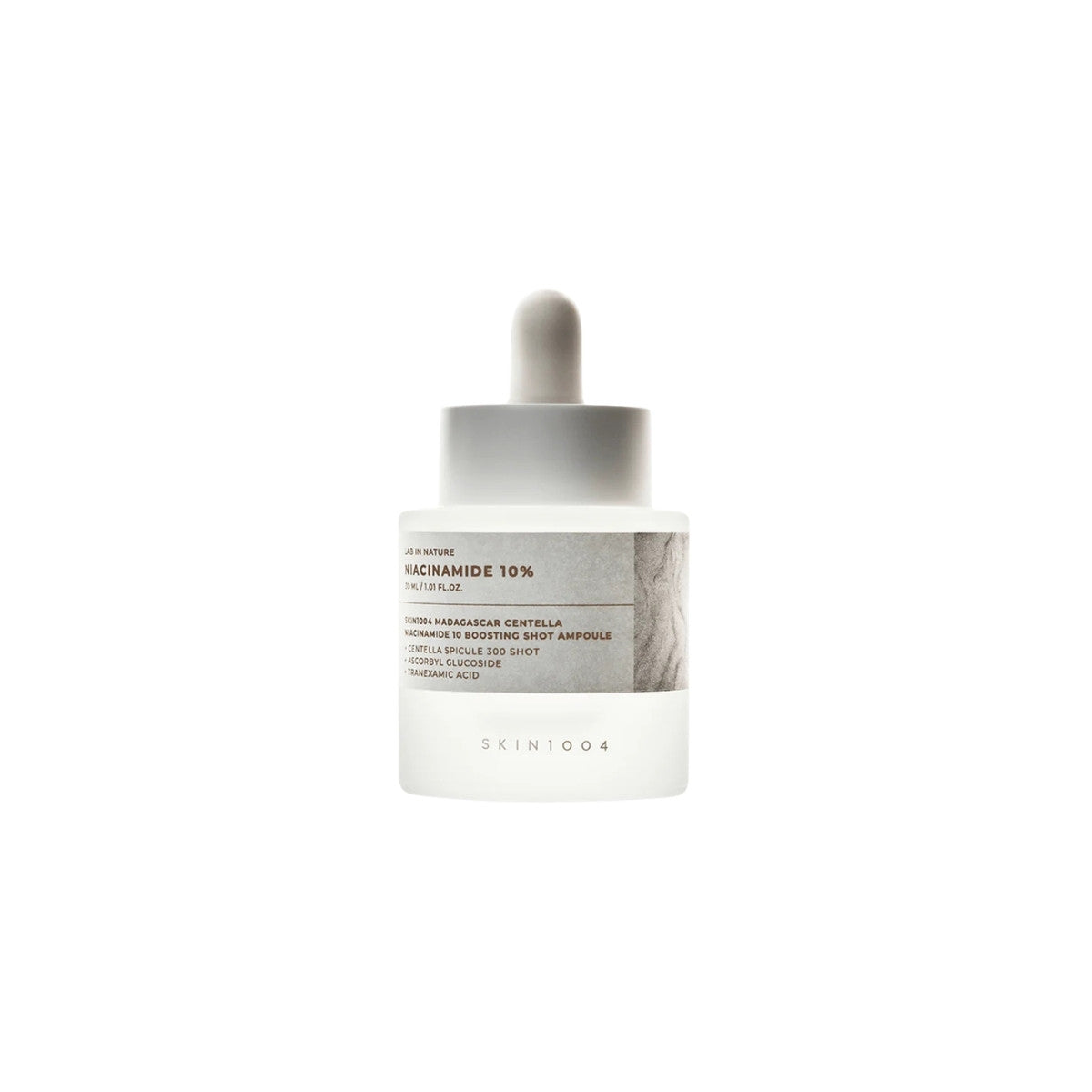 SKIN1004 Madagascar Centella Niacinamide 10 Boosting Shot Ampoule 30ml β brightening facial serum with 10% niacinamide and Centella Asiatica available at Atelier De Glow UAE.