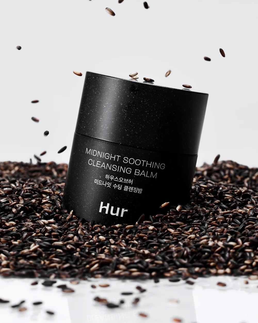 Sorbet-like texture of House of Hur Midnight Cleansing Balm – Non-stripping, purple balm-to-oil cleanser for nightly use at Atelier De Glow UAE.