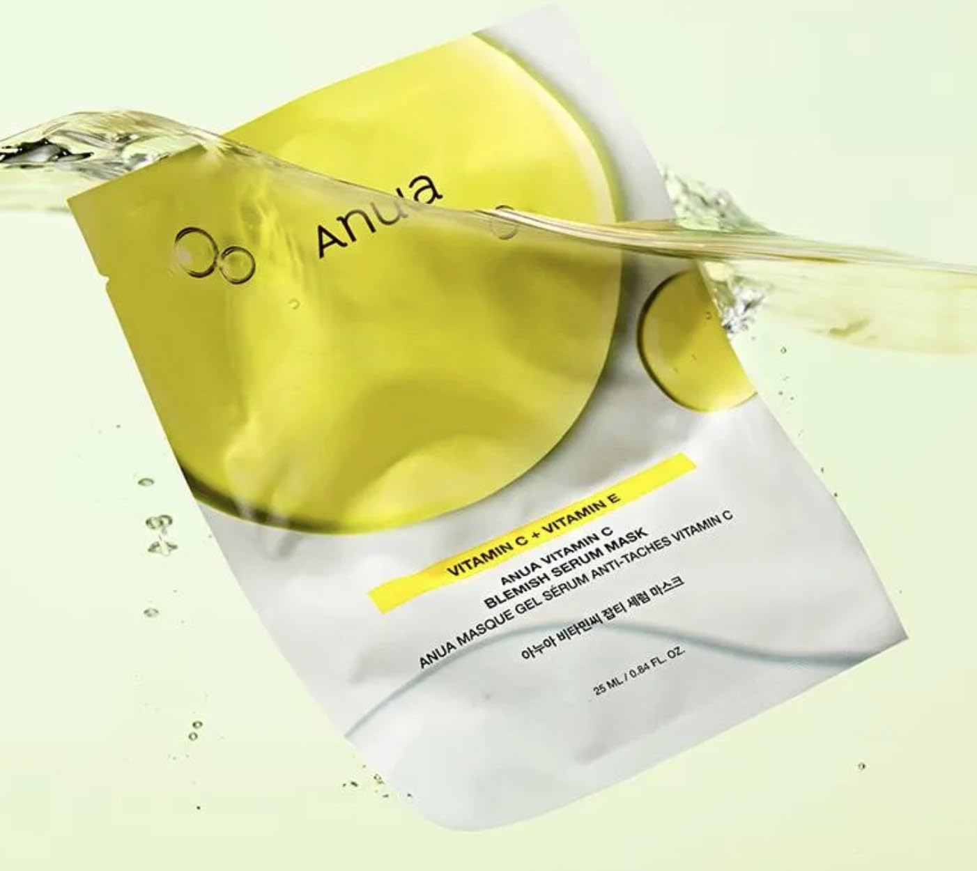Thin, high-transparency Anua Vitamin C Mask sheet – Breathable Korean mask drenched in brightening serum for "Glass Skin" clarity at Atelier De Glow UAE.