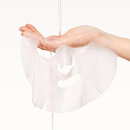 Eco-friendly soft sheet of Anua Peach 70 Niacin Mask β High-adhesion Korean mask drenched in Vitamin B12 and Peach essence at Atelier De Glow UAE.