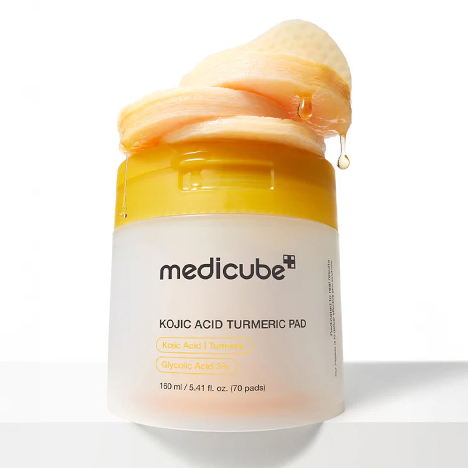Medicube Kojic Turmeric Pads for deep stubborn melasma, dark brown age spots, post-acne blemishes, and muddy sallow skin tones β Tone corrector from Atelier De Glow UAE.