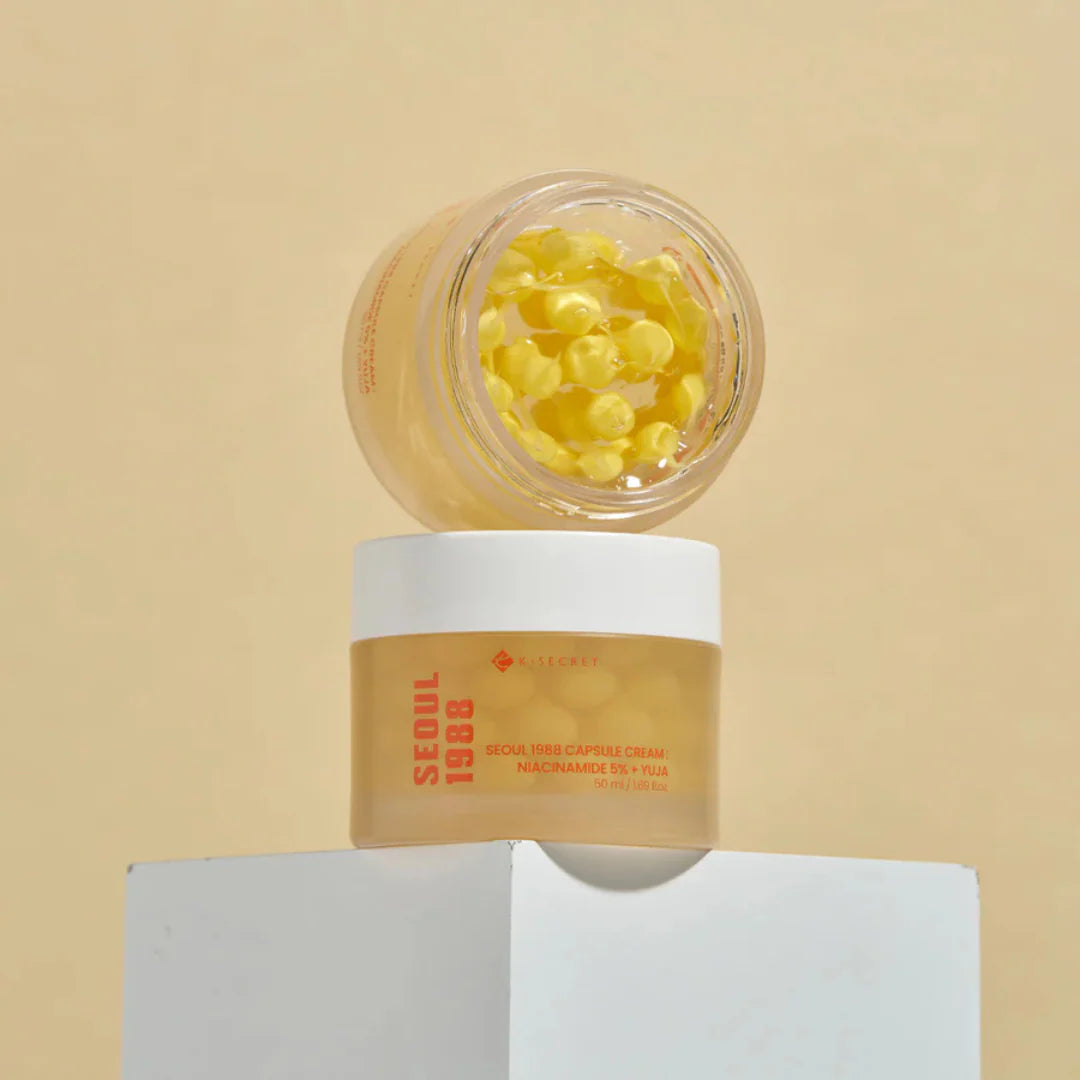 Unique dual-texture of KSECRET SEOUL 1988 Cream showing melting vitamin beads suspended in a clear, water-burst gel at Atelier De Glow UAE.