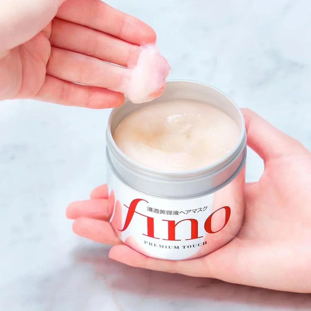 Rich, creamy, and nourishing hair mask by Shiseido Fino that deeply penetrates hair fibers for instant softness, manageability, and a healthy luster at Atelier De Glow UAE.