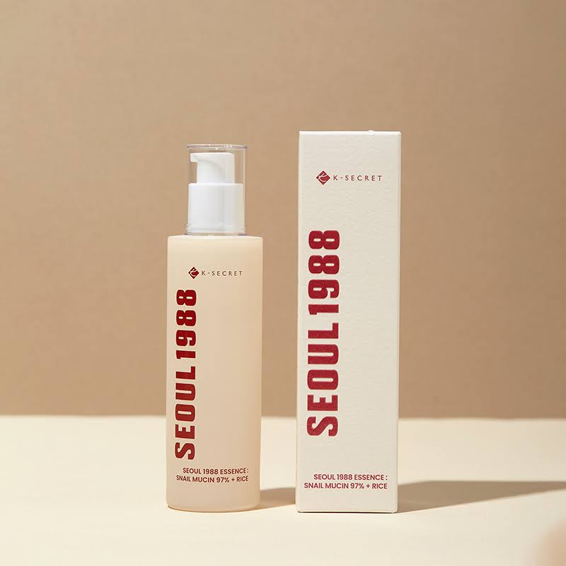 Rich, slippery, and beautifully lightweight fluid texture of KSECRET SEOUL 1988 Snail Mucin 97% Essence on damp skin at Atelier De Glow UAE.
