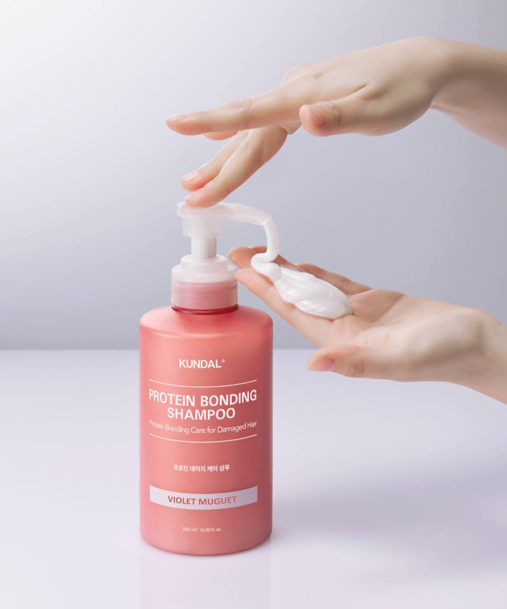 Rich lathering KUNDAL Protein Bonding Care Shampoo β Sulfate-free, 17 Amino Acid infused Korean scalp and hair cleanser at Atelier De Glow UAE.