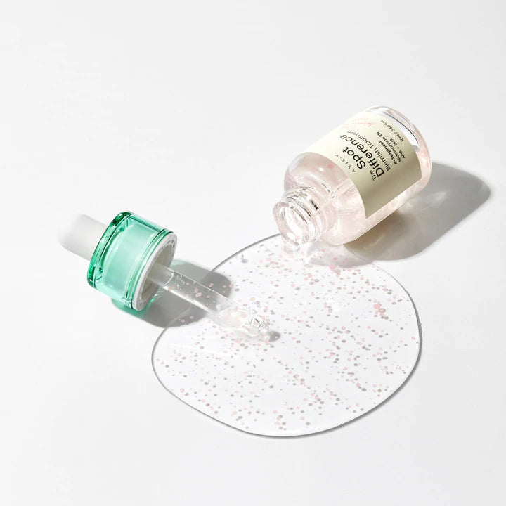 Lightweight, clear gel texture of AXIS-Y Blemish Treatment β Invisible Korean skincare for "Glass Skin" clarity at Atelier De Glow UAE.