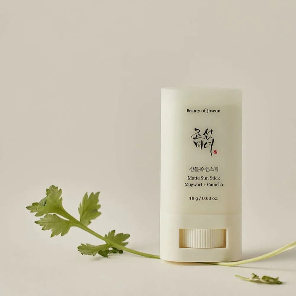 Smooth, non-greasy application of Beauty of Joseon Matte Sun Stick – Travel-friendly Korean skincare for "Glass Skin" sun protection at Atelier De Glow UAE.