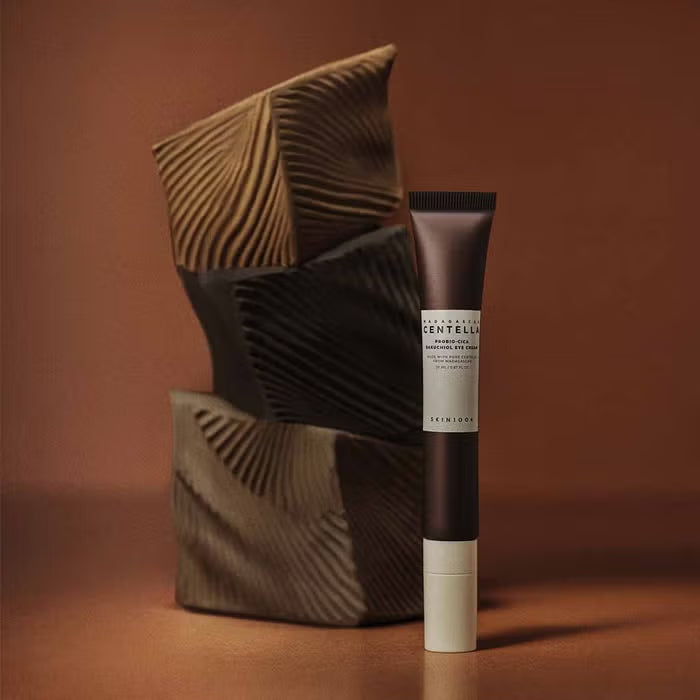SKIN1004 Madagascar Centella Probio-Cica Bakuchiol Eye Cream for reducing fine lines, dark circles, and under-eye puffiness with a non-irritating formula from Atelier De Glow UAE.