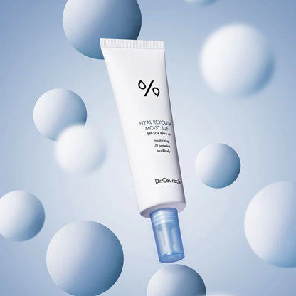 Soft, essence-like, and rapid-absorbing white cream texture of Dr. Ceuracle Hyal Reyouth Sunscreen melting transparently into the skin canvas at Atelier De Glow UAE.