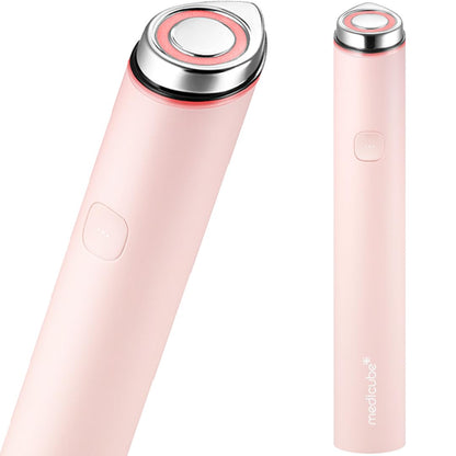 Sleek, pocket-sized pink ergonomic design of Medicube AGE-R Booster Pro Mini being guided smoothly over a dewy facial canvas at Atelier De Glow UAE.