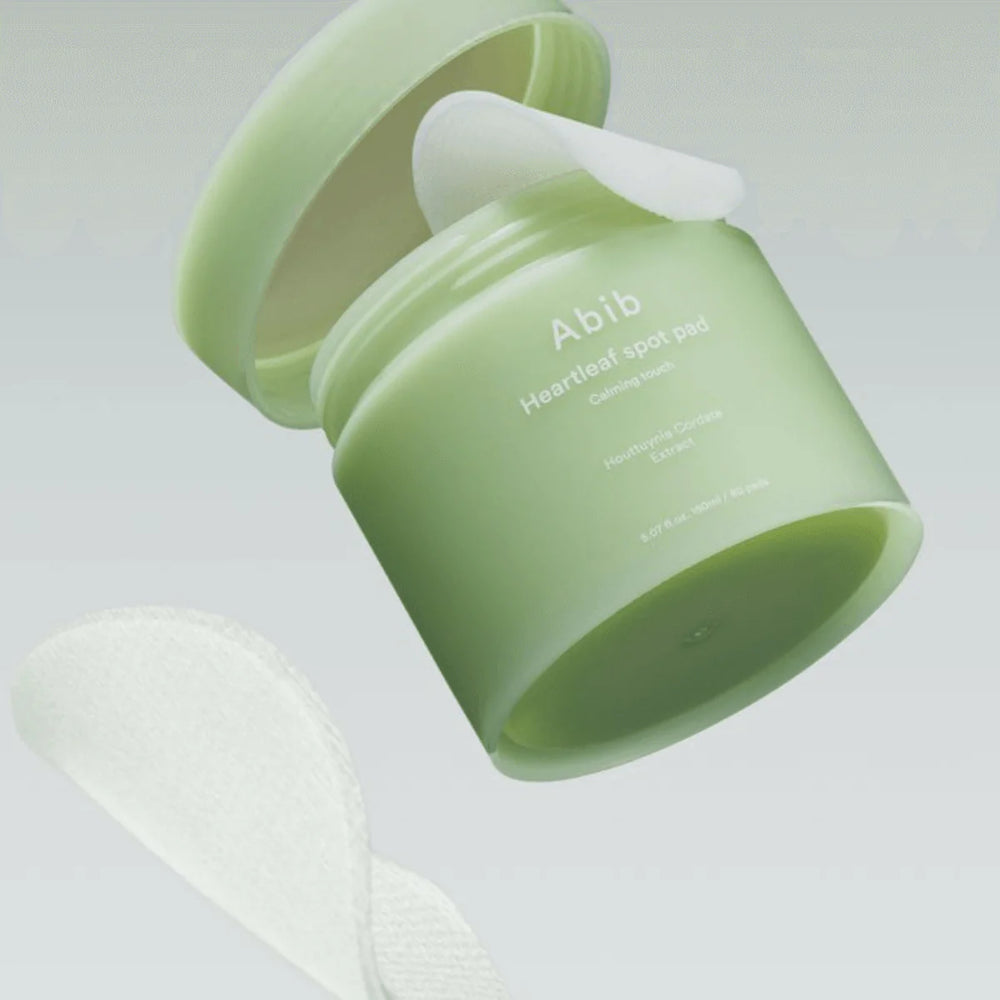 Dual-sided Abib Heartleaf Spot Pad – Gauze side for gentle exfoliation and plain side for intensive "Spot Masking" at Atelier De Glow UAE.