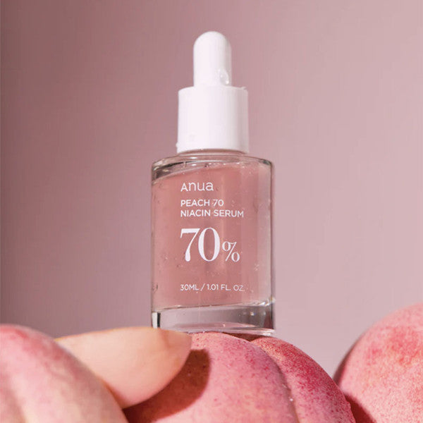 Anua Peach 70 Niacin Serum for fading dullness, evening out skin tone, and refining texture to reveal a healthy, natural glow from Atelier De Glow UAE.