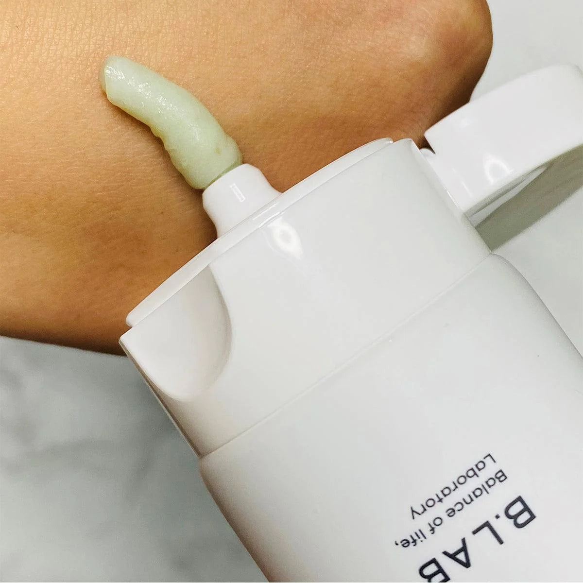Creamy, rich foam of B.LAB Matcha Hydrating Cleanser – Soothing Korean skincare for "Glass Skin" clarity and moisture at Atelier De Glow UAE.