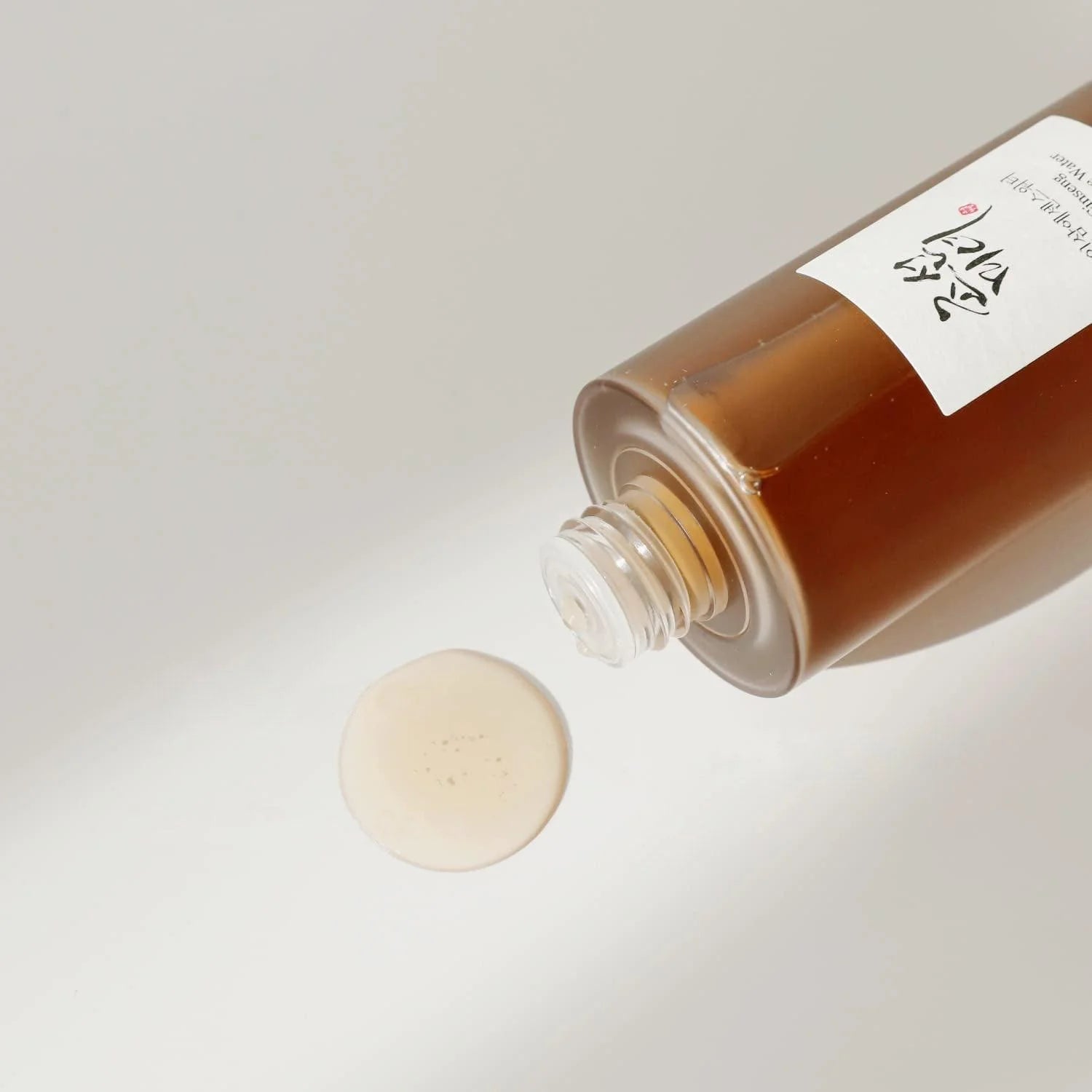 Lightweight, silky texture of Beauty of Joseon Ginseng Essence Water – Fast-absorbing liquid for "Glass Skin" luminosity at Atelier De Glow UAE.