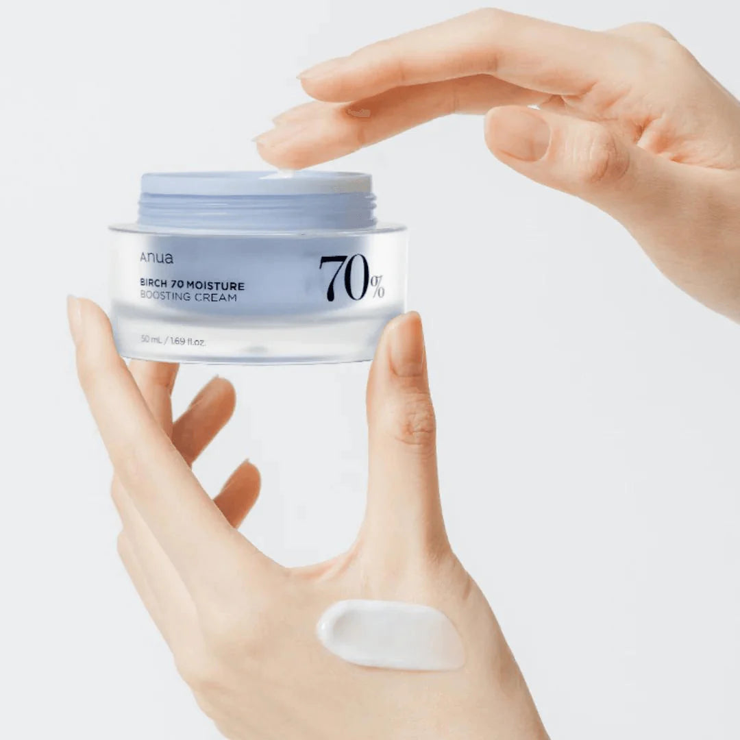 Weightless, watery, and soothing translucent gel-cream texture of Anua Birch 70 Cream melting instantly into the skin canvas at Atelier De Glow UAE.