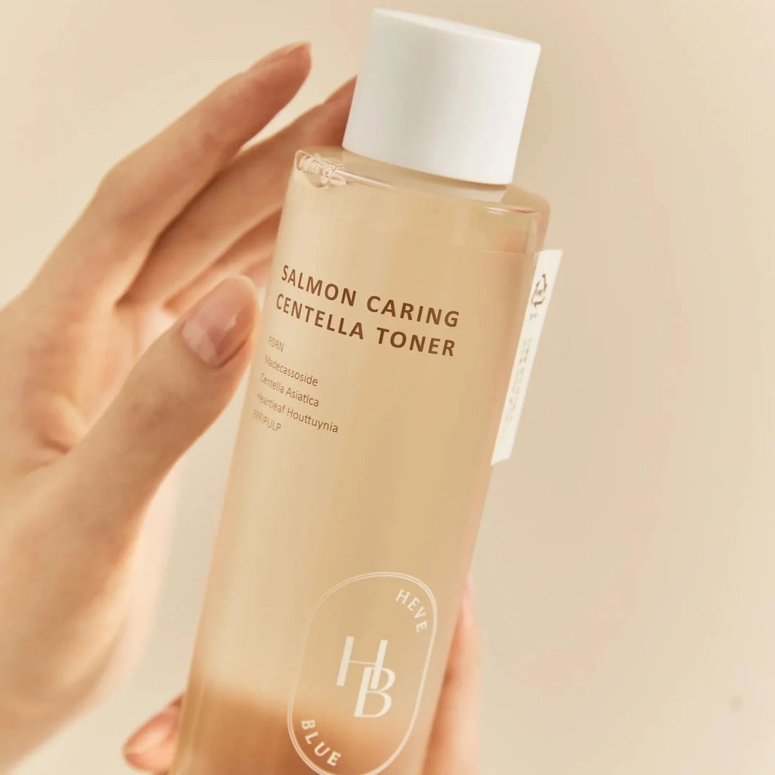 Refreshing, watery texture of HEVEBLUE Salmon Centella Toner – Fast-absorbing, hydrating prep liquid for sensitive skin at Atelier De Glow UAE.