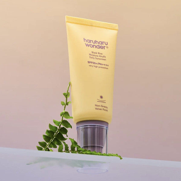 Weightless, velvet-finish texture of Haruharu Wonder Black Rice Sunscreen – Fast-absorbing, moisturizing sun cream for daily wear at Atelier De Glow UAE.