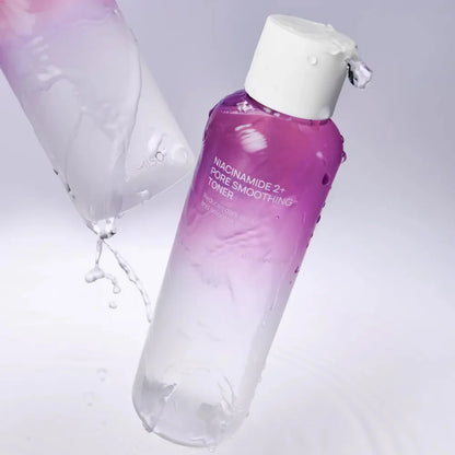 Water-light, refreshing texture of JUMISO Niacinamide 2+ Toner – Large 205ml bottle of Korean pore-refining toner at Atelier De Glow UAE.