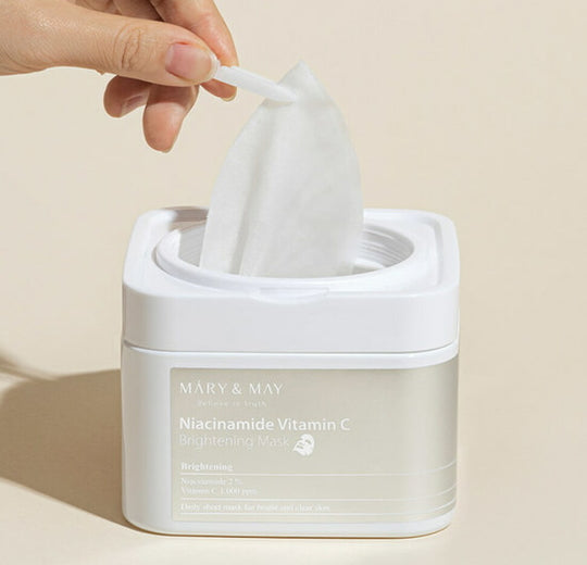 MARY &amp; MAY brightening sheet mask for stubborn acne dark spots, sun pigmentation, and dull uneven skin tones – Daily booster from Atelier De Glow UAE.
