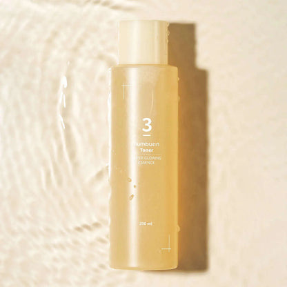 Lightweight, fast-absorbing, and non-sticky essence-toner texture by Numbuzin that leaves skin feeling plump, deeply moisturized, and luminous at Atelier De Glow UAE.