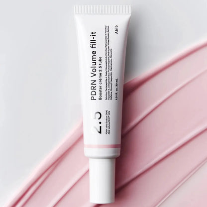 Rich, silky, and precise targeted cream texture of Abib Volume Fill-it Booster Crème dispensing directly from its fine needle-tip tube at Atelier De Glow UAE.