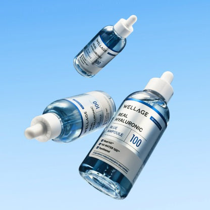 Applying WELLAGE Hyaluronic Blue Ampoule for instant plumping - K-beauty hydration hero - Atelier De Glow UAE