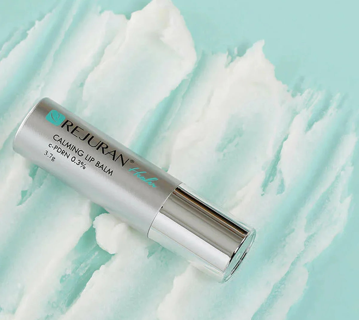 Ultra-hydrating, non-greasy, and protective REJURAN Calming Lip Balm delivering daily deep conditioning for soft, healthy lips at Atelier De Glow UAE.