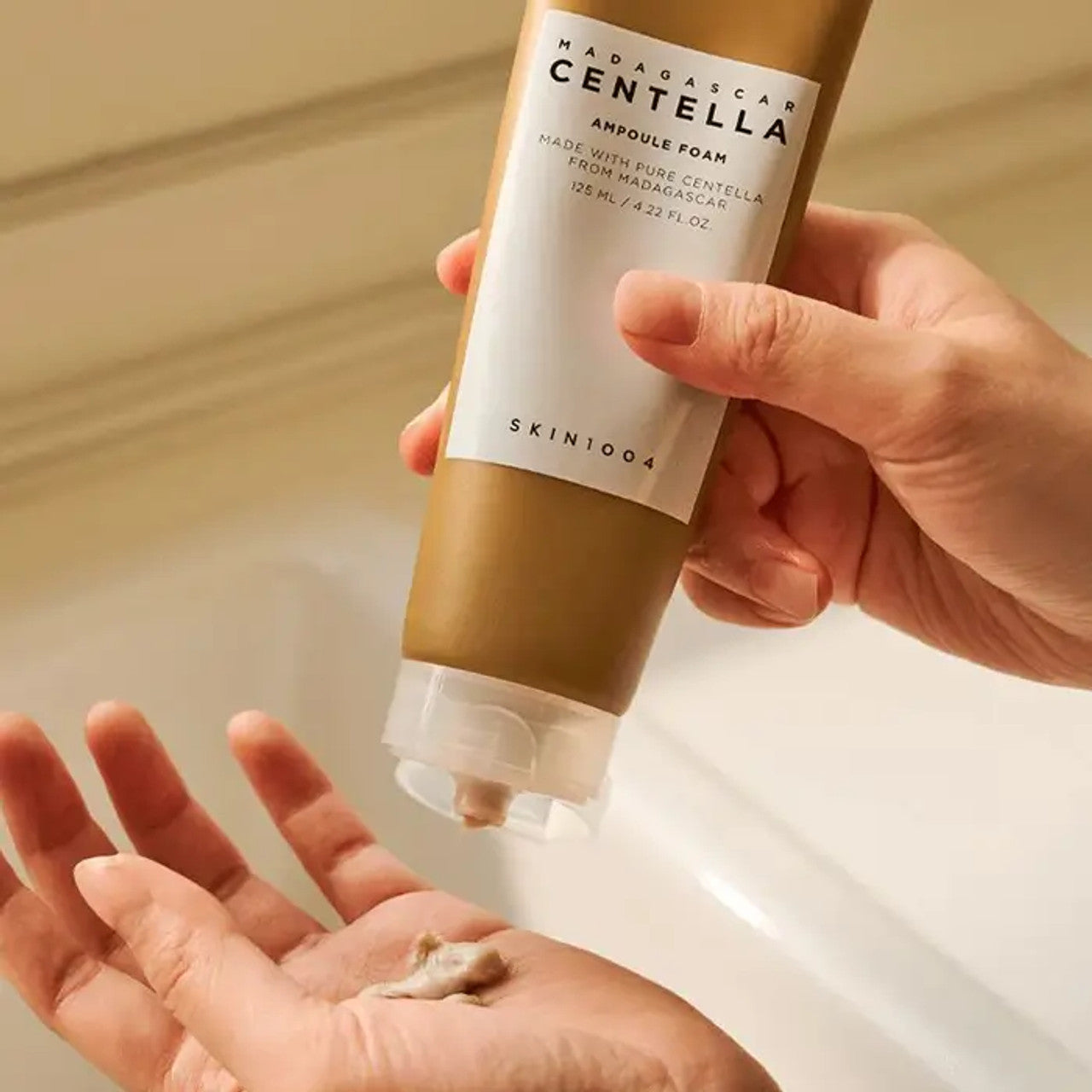 Rich, micro-bubble foaming cleanser texture by SKIN1004 that deeply purifies pores while leaving skin feeling soft, hydrated, and refreshed at Atelier De Glow UAE.