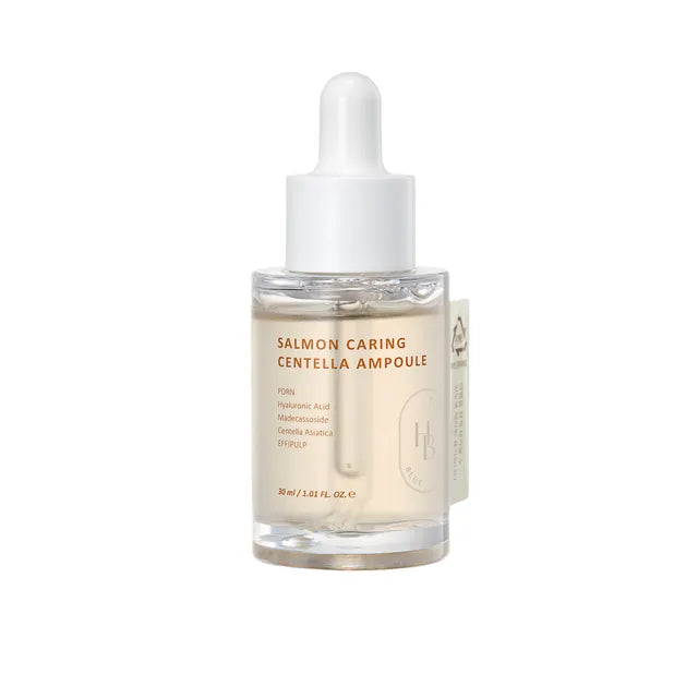 HEVEBLUE Salmon Caring Centella Ampoule – 30ml skin-repairing serum with Salmon PDRN DNA and Centella Asiatica available at Atelier De Glow UAE.