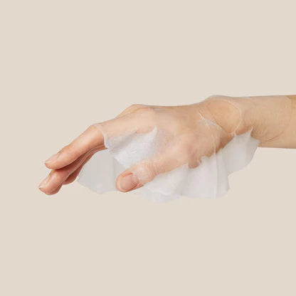 Eco-friendly soft sheet of APRILSKIN Carrotene IPMP Mask – High-adhesion Korean mask drenched in clarifying and hydrating serum at Atelier De Glow UAE.