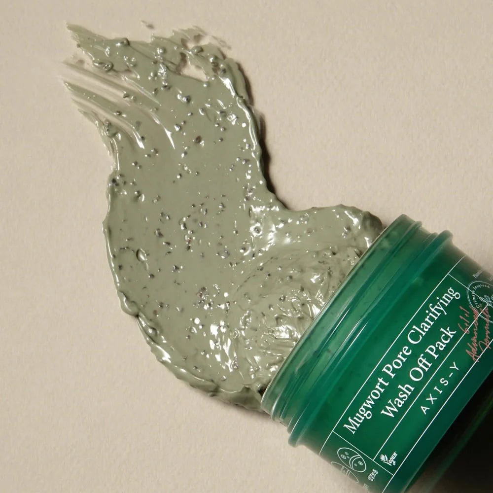 Creamy clay texture with exfoliating Adzuki Bean particles – AXIS-Y Mugwort Wash Off Pack for "Glass Skin" clarity at Atelier De Glow UAE.