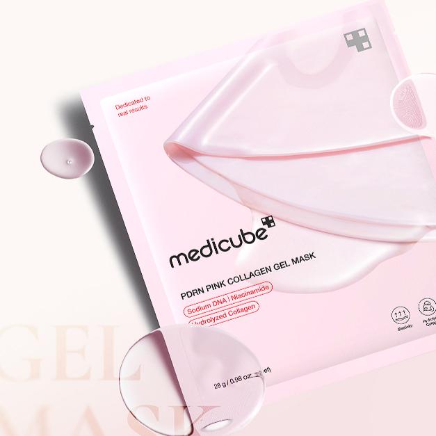 Soft, custom-fitting pink hydrogel texture of Medicube PDRN Collagen Mask cooling down and adhering tightly to facial features at Atelier De Glow UAE.