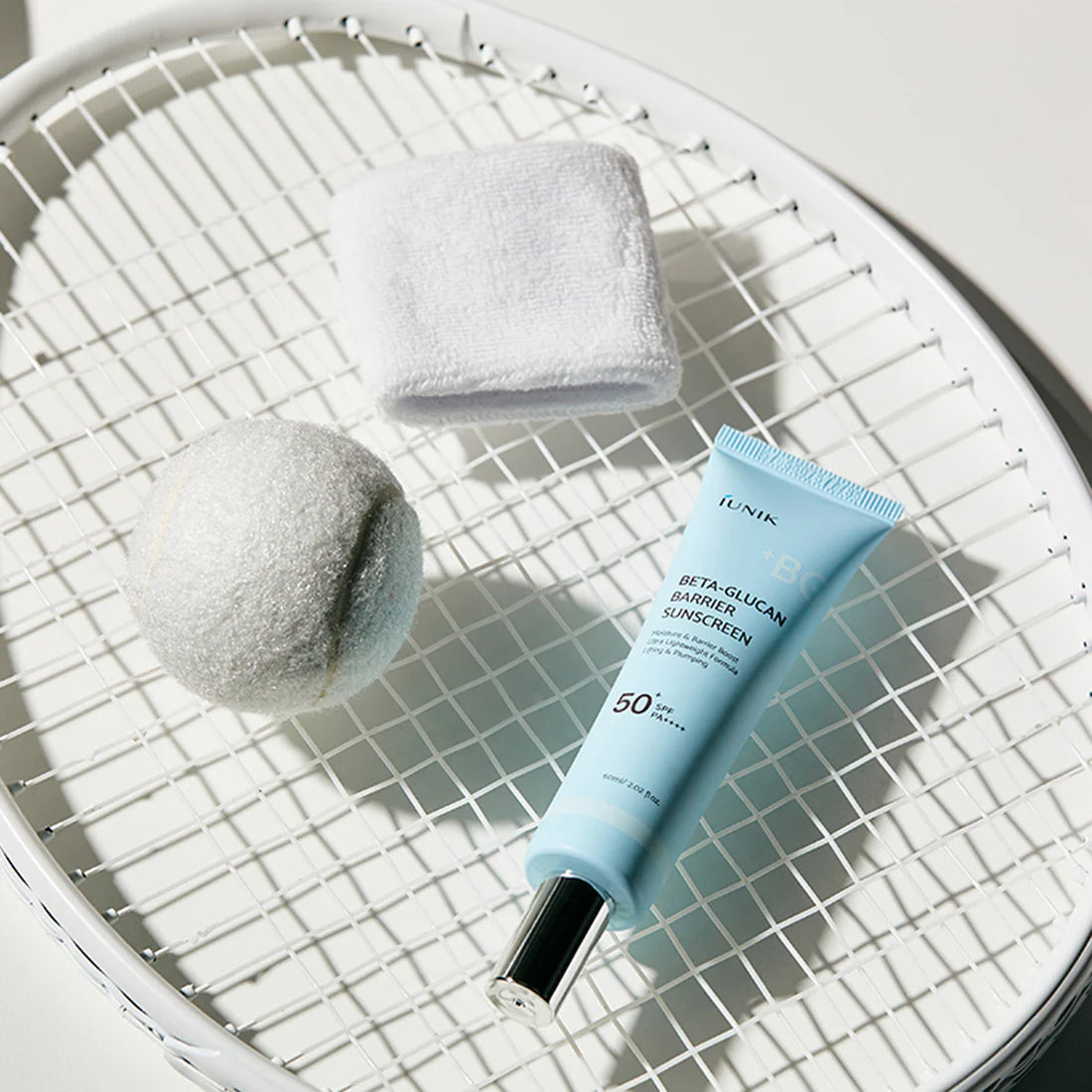 Applying iUNIK Barrier Sunscreen for sensitive skin protection - K-beauty daily SPF - Atelier De Glow UAE