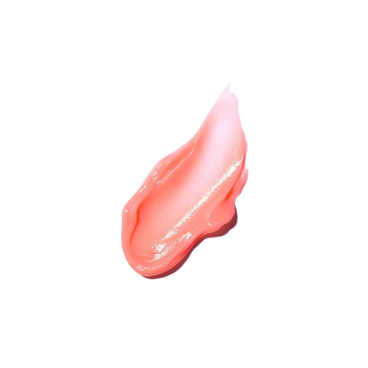 Rich, melting pink balm texture of Laneige Berry Lip Sleeping Mask being scooped with its applicator spatula at Atelier De Glow UAE.