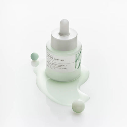 Weightless, watery, and non-sticky clear fluid gel texture of SKIN1004 Azelaic Acid 10 Ampoule absorbing into a texturized face at Atelier De Glow UAE.