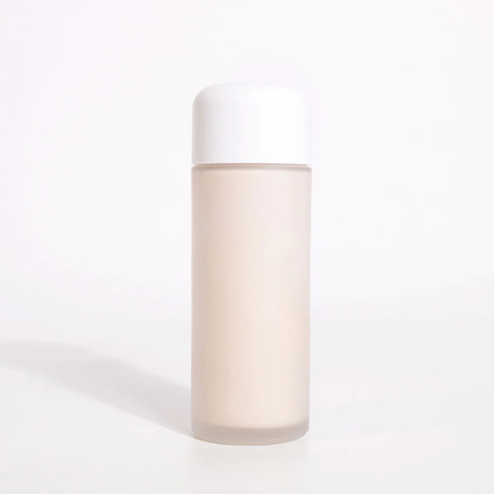 Luxurious milky-tea texture of Dr. Ceuracle Kombucha Essence – Lightweight, hydrating bi-phase toner-serum hybrid at Atelier De Glow UAE.