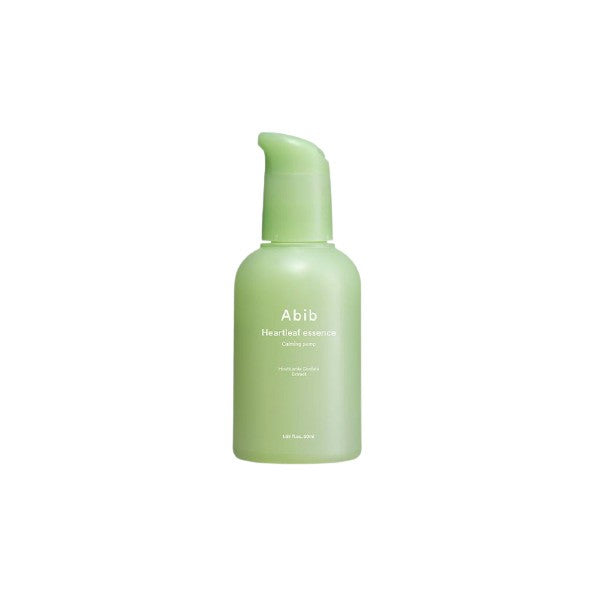 Abib Heartleaf Essence Calming Pump : A soothing skincare product featuring a pale green pump bottle with the Abib logo. The essence contains heartleaf extract known for its calming properties, presented against a serene background.